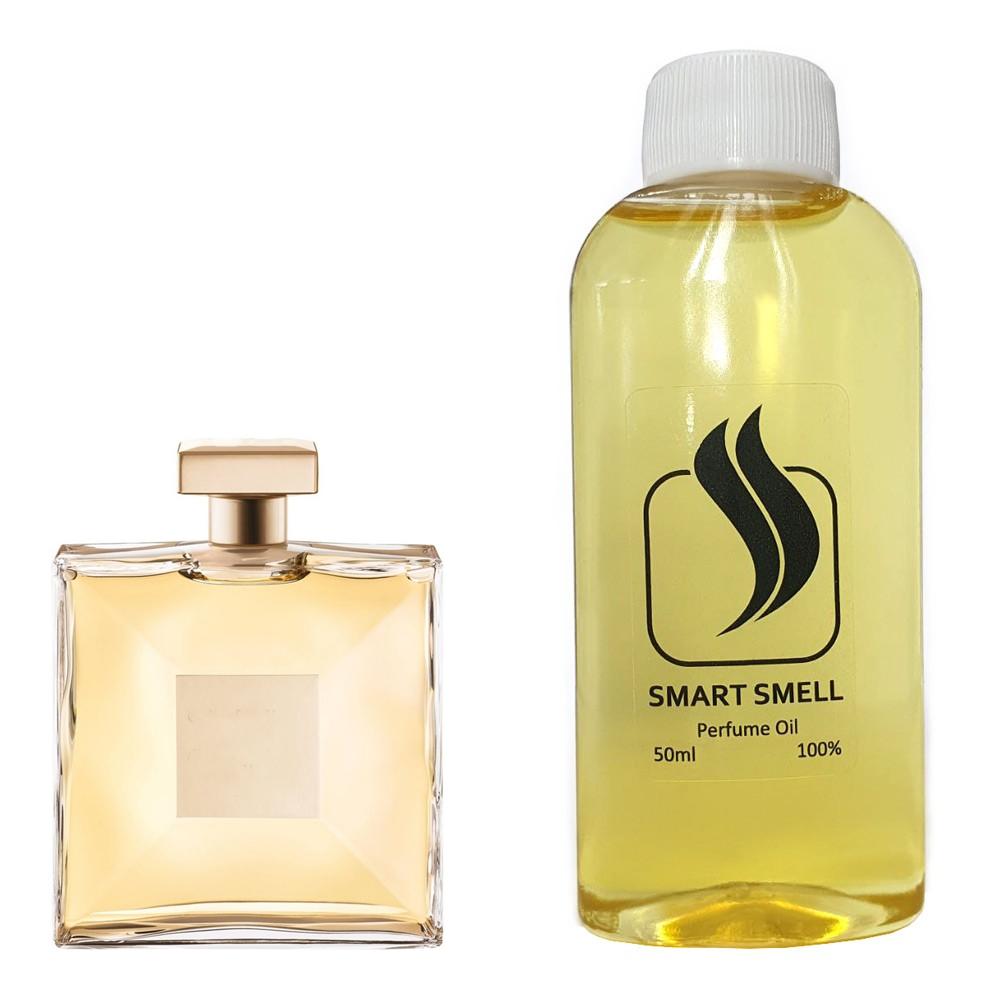 Парфюмерный концентрат 50 мл c аналогом Chanel, Gabrielle. Товар на фото справа, слева - пример оригинального флакона.