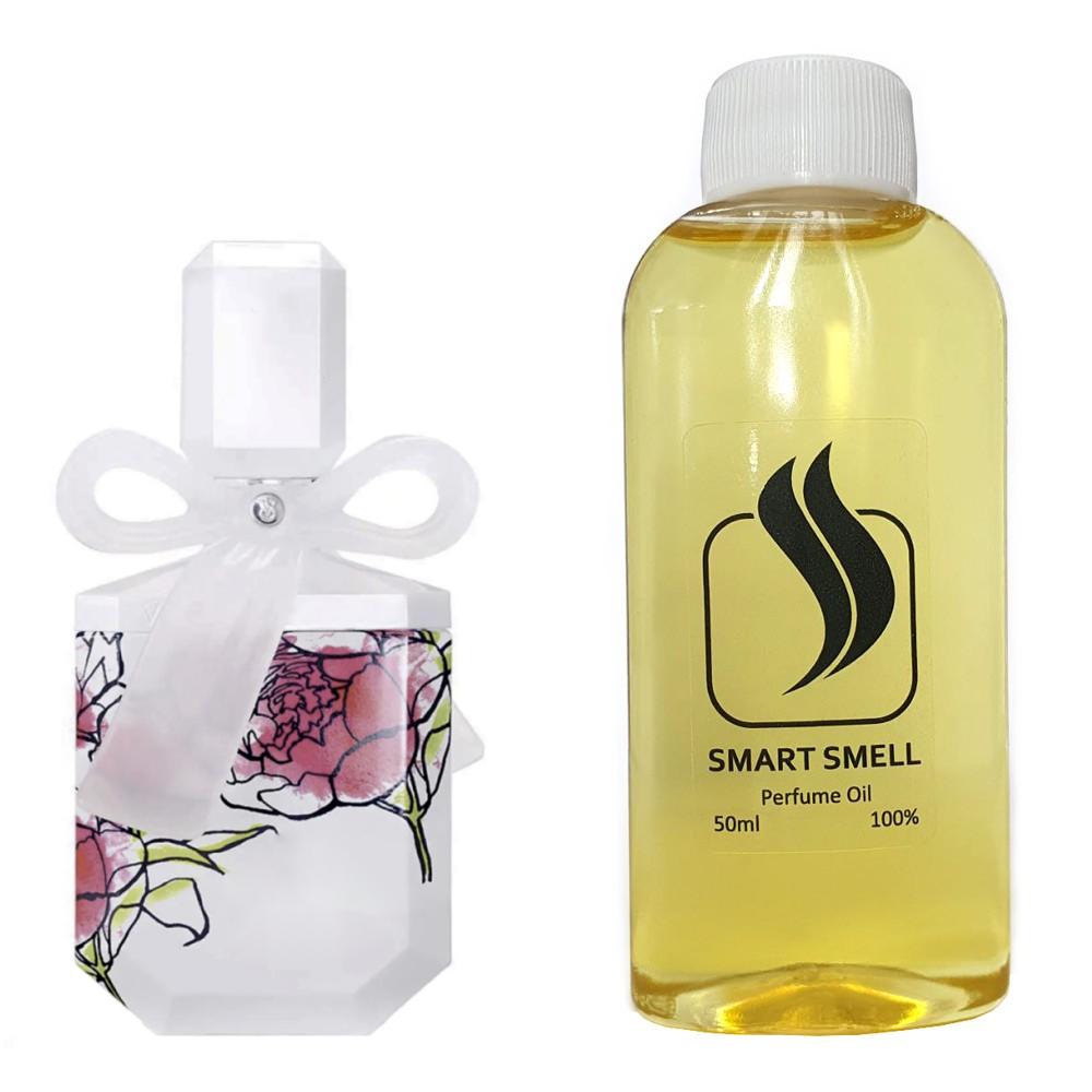 Парфюмерный концентрат 50 мл c аналогом Victoria's Secret, Victoria's Secret XO. Товар на фото справа, слева - пример оригинального флакона.